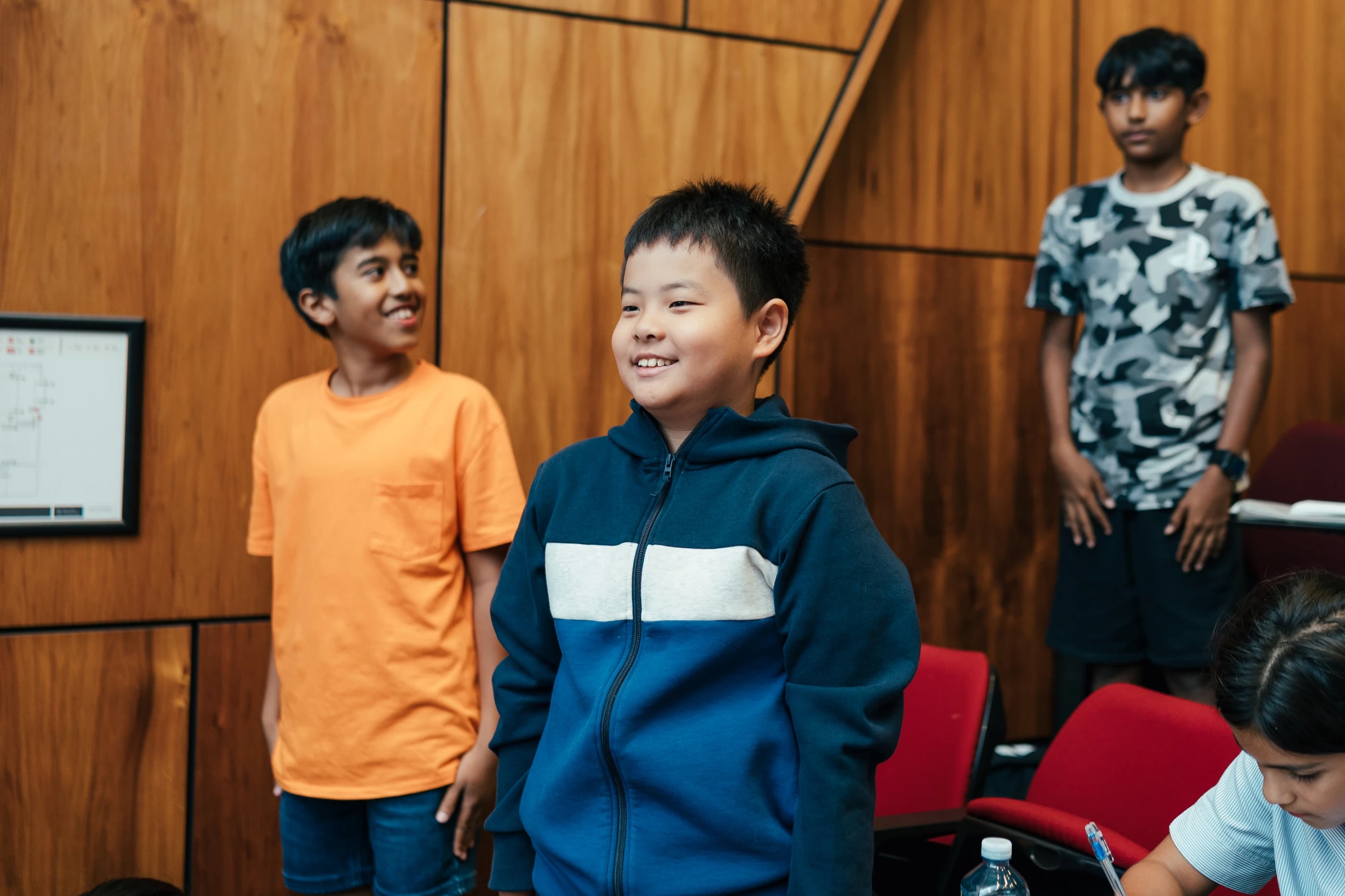 Students smiling during an interactive activity